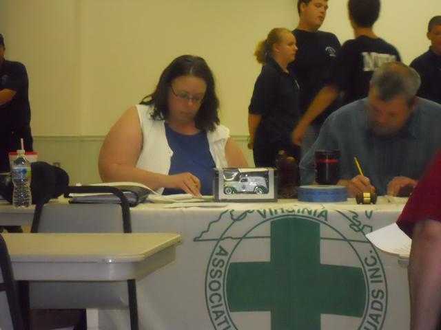 Vicky Langford and district VP Steve Dove prepare for start of meeting in culpeper June 2010